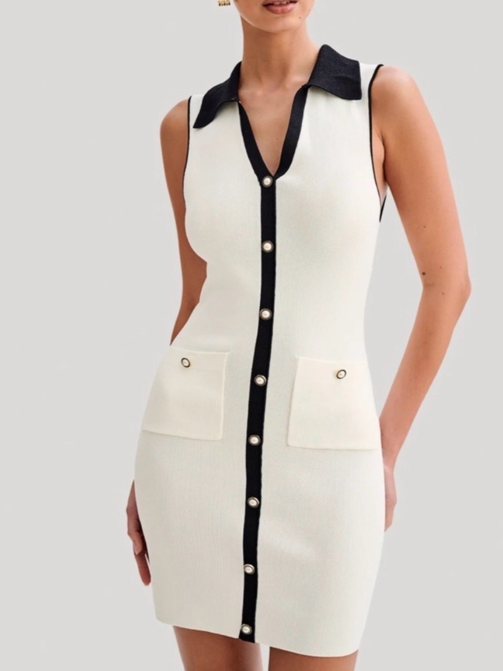 Sleeveless Cream Knit Button-Front Dress with Black Trim